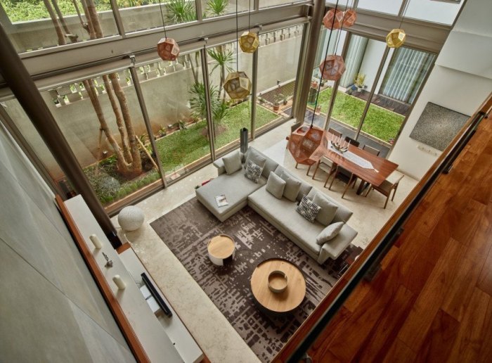 House open architecture raw indonesia jakarta wirawan tropical rumah workshop kotak kayu space room box wooden connects nearly outdoors every