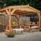 Gazebo rattan underneath woodberry 4m gravel 6m